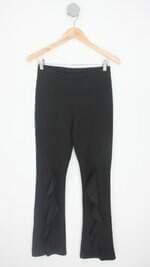 calça de tecido feminina preta com babado