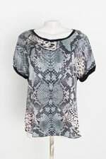 blusa indumentaria feminina estampada com recortes